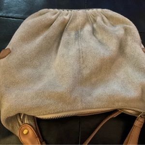 Holding horses suede bag